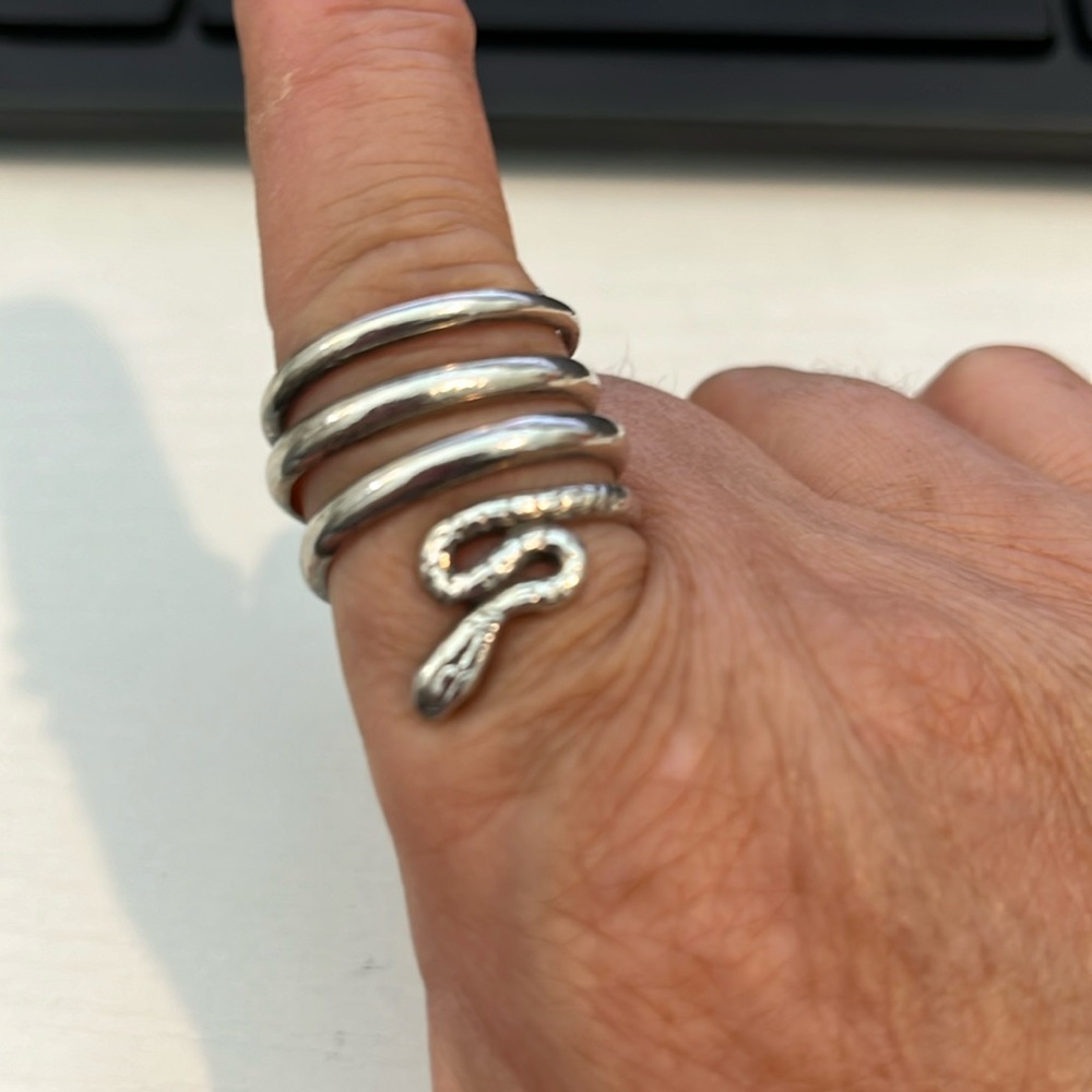Sterling snake ring adjustable.